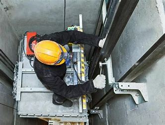 ENGELS technician servicing an elevator